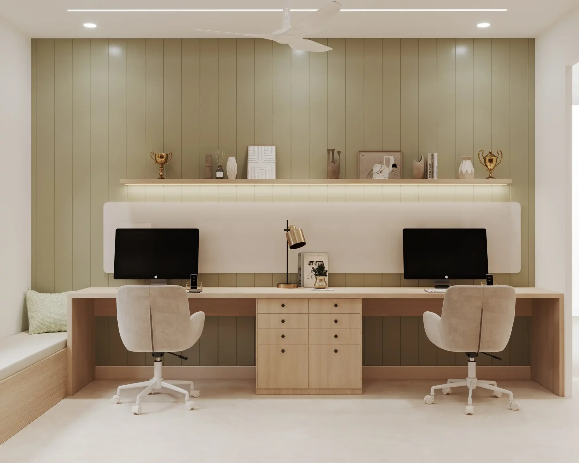 Modern home office featuring dual workstations, light wood furniture, soft seating, and green paneled walls, illuminated above.